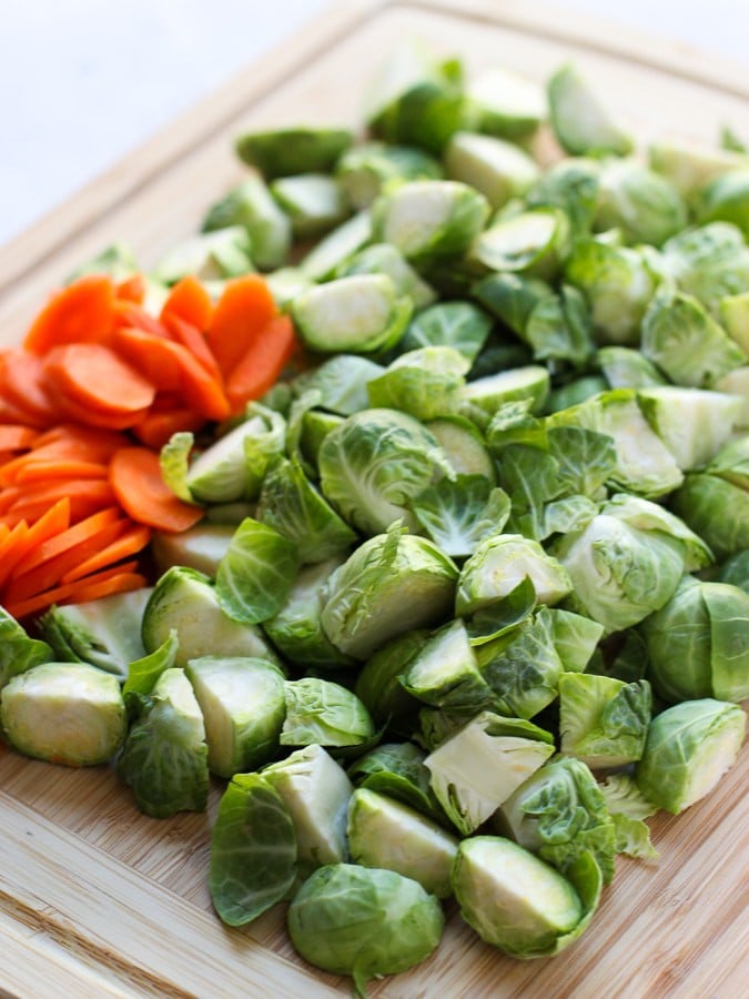 Uncooked Brussel sprouts and carrots for Sautéed Garlic Brussel Sprouts and Carrots