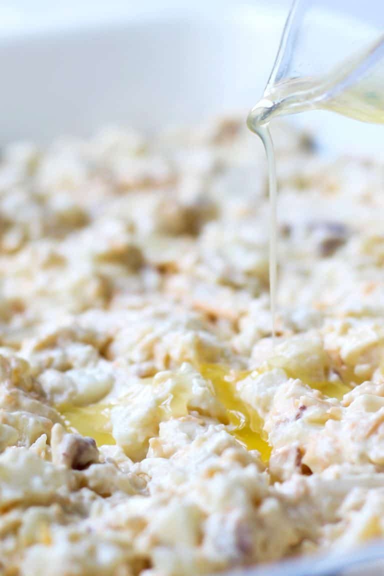 Adding butter to an uncooked casserole dish