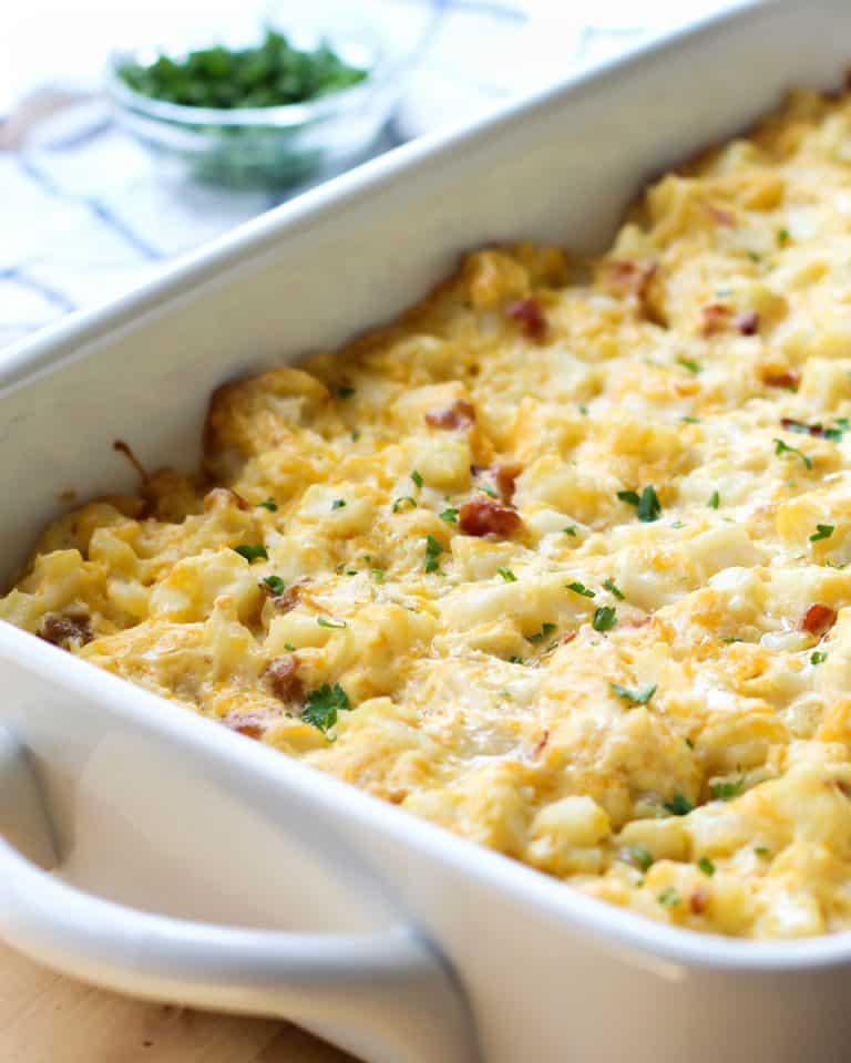 A large rectangular casserole of Cheesy Bacon Potato Casserole