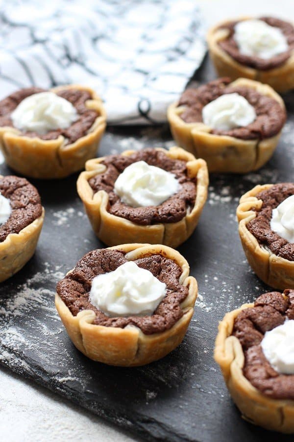 Mini Chocolate Chess Pie with whipped cream on top