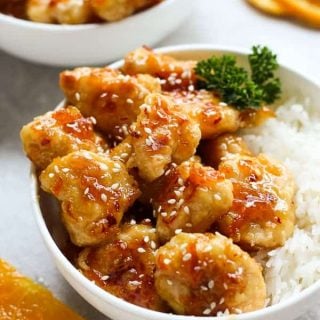 A bowl of Easy Baked Orange Chicken with rice