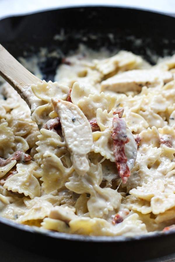 Creamy Sun-dried Tomato Pasta with Chicken in a skillet