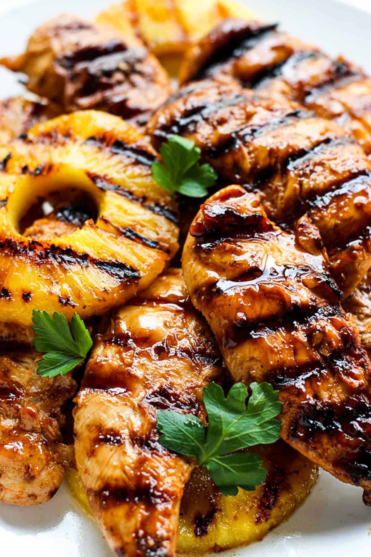 A closeup of Hawaiian Chicken and pineapple rings