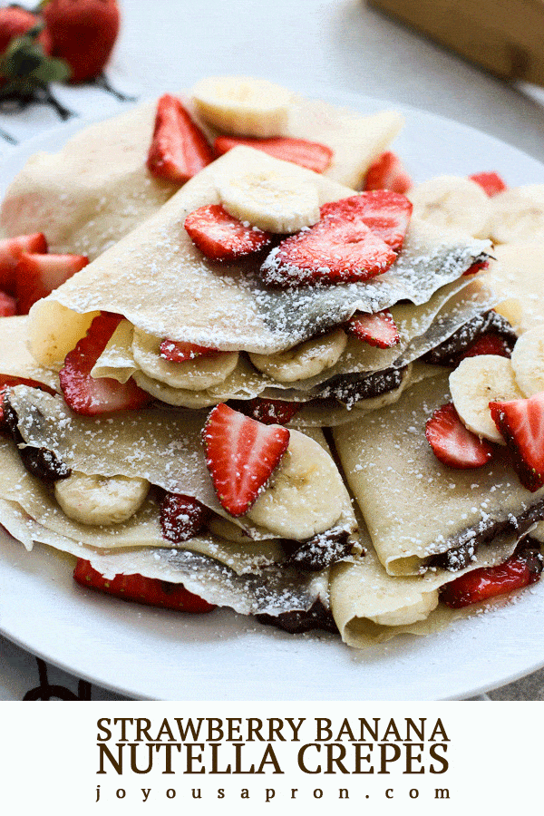 Strawberry Banana Nutella Crepes - easy crepe recipe using just a non-stick skillet! No fancy crepe-making equipment needed! Thin, soft crepe filled with strawberries, bananas and Nutella is the perfect delicious breakfast, dessert, snack for any day! via @joyousapron
