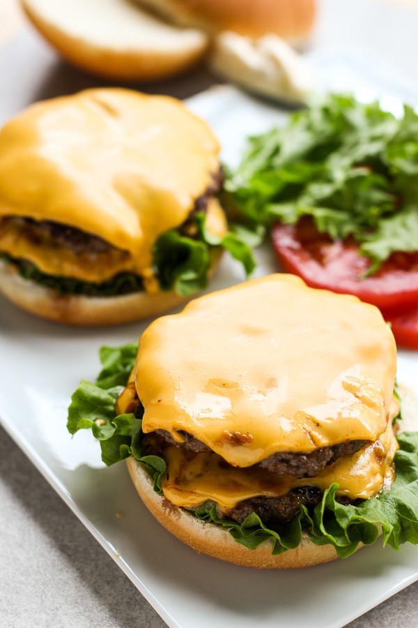 Ultimate Homemade Burger in the process of being assembled