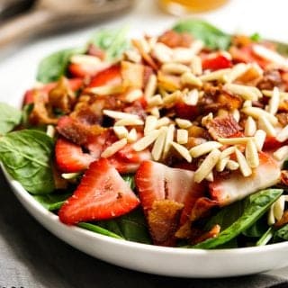 A bowl of Spinach Strawberry Bacon Salad