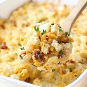 scooping out bacon potato casserole