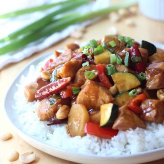 A plate of chicken in kung pao sauce