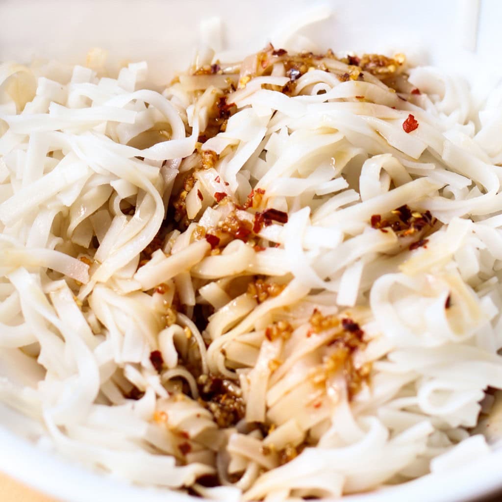 Rice noodles tossed in sauce