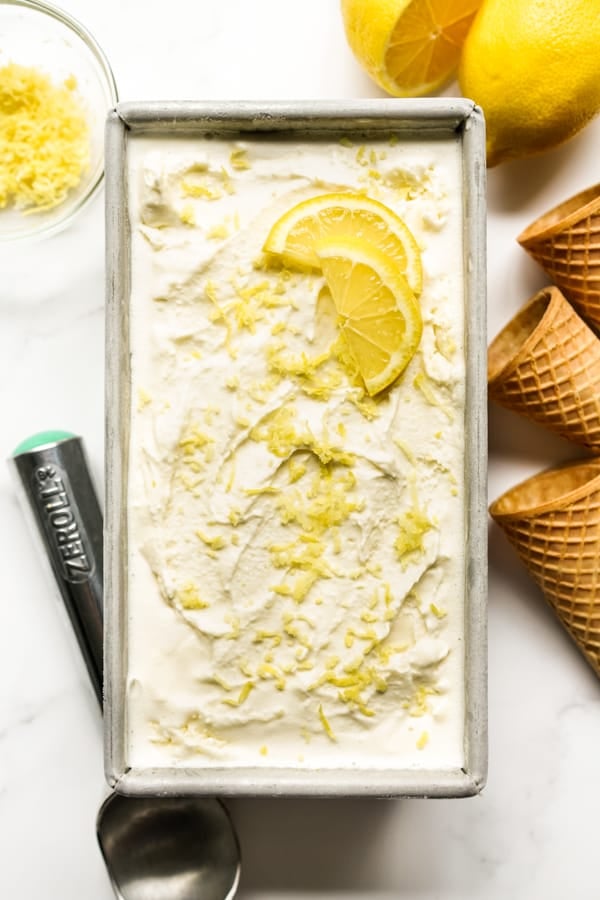 Top down view of a rectangular tub of fresh Lemon ice Cream