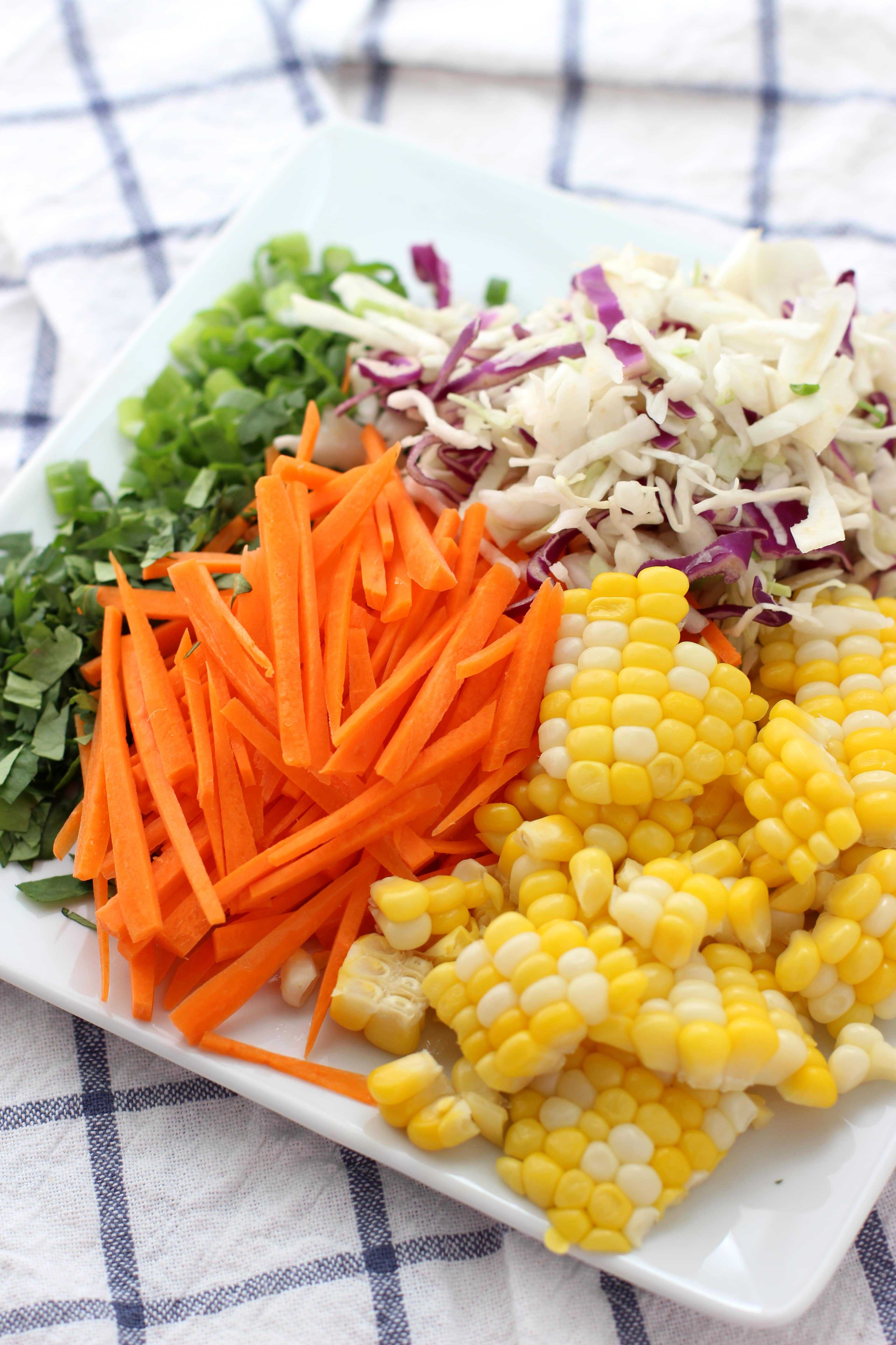 Fresh corn, carrots, cabbage, scallions and cilantro