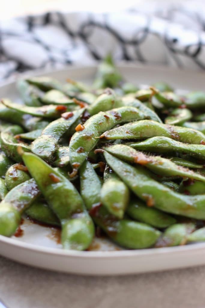 A plate of Garlic Edamame