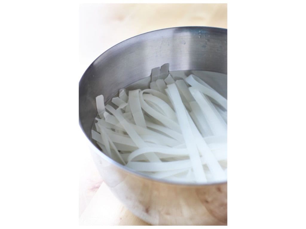 Soaking to soften flat rice noodles