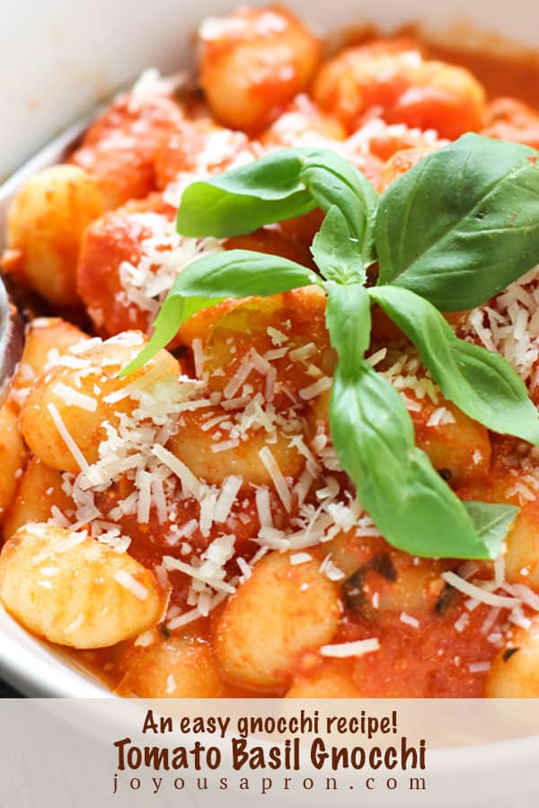 Tomato Basil Gnocchi - easy and yummy Italian pasta recipe! Gnocchi tossed in a highly flavorful, cheesy and creamy tomato basil sauce. Ready under 30 minutes via @joyousapron