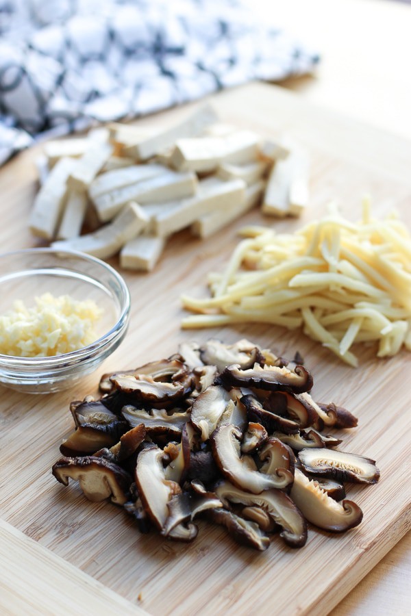 Shiitake mushrooms, bamboo shoots, tofu, and minced garlic for Hot and Sour Soup