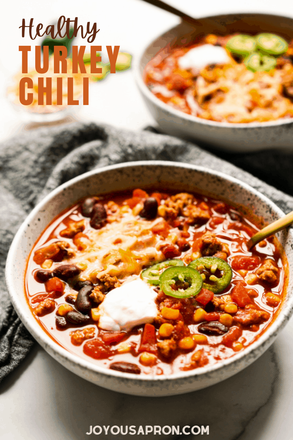 Healthy Turkey Chili - easy dinner recipe - ready in 30 minutes! Made with ground turkey, this tomato-based chili is chunky, cozy, and packed full of bold flavors and great textures. via @joyousapron