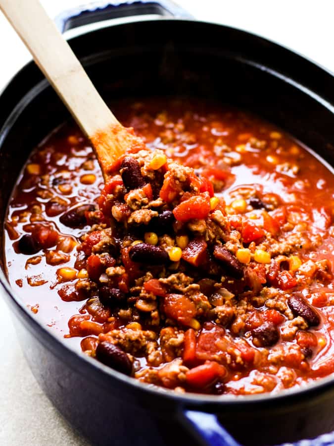 Cooking chili in an oval Dutch oven