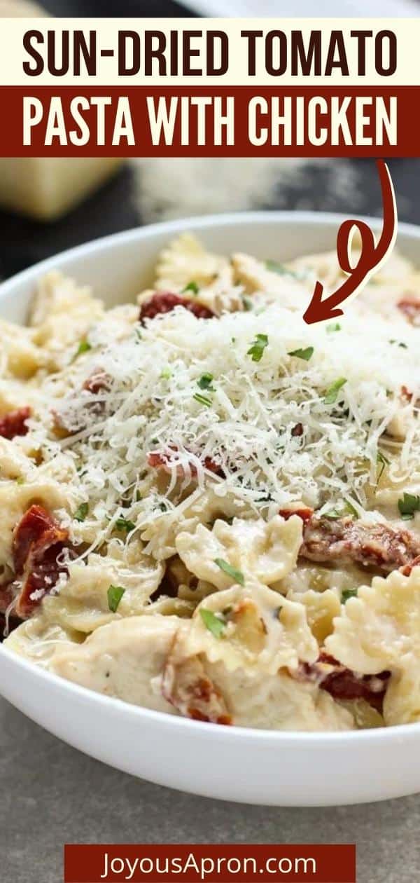 Creamy Sun-dried Tomato Pasta with Chicken - delicious Italian pasta recipe. Farfalle pasta tossed in a cheesy cream-based sauce infused with garlic and butter, mixed with sun-dried tomatoes and baked chicken with Italian herbs. via @joyousapron
