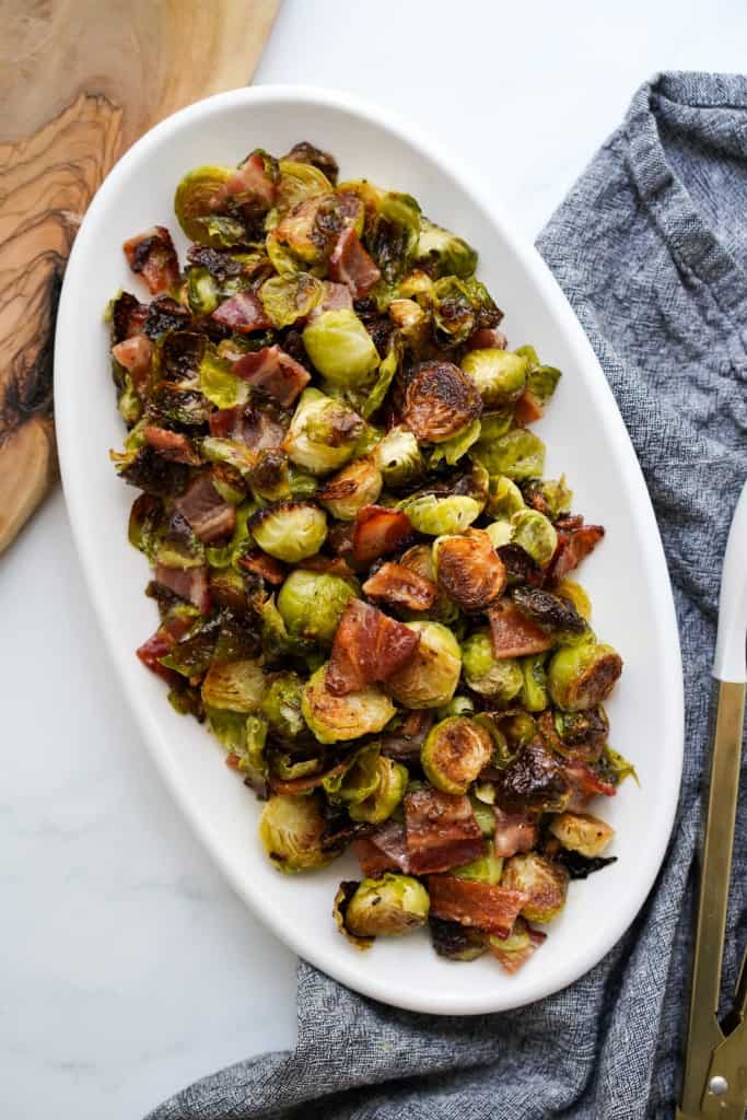 A platter of roasted brussels sprouts with bacon