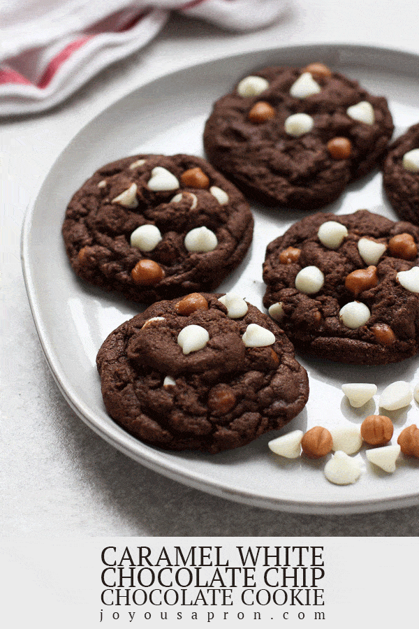 Caramel White Chocolate Chip Chocolate Cookies - soft and fluffy chocolate cookies filled with gooey caramel chips and white chocolate chips. A delicious sweet treat perfect for holiday baking! via @joyousapron
