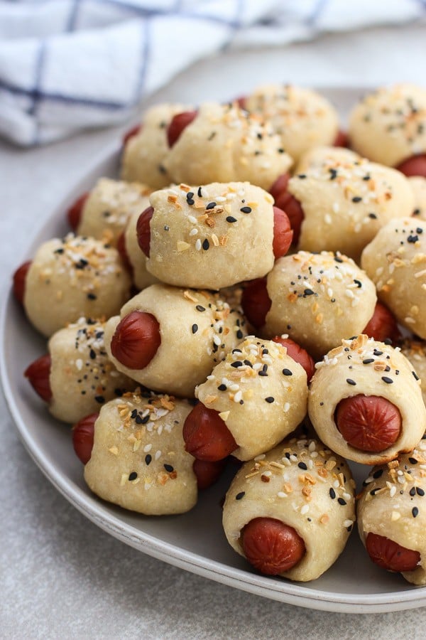 A plate full of Everything Bagel Pigs in the Blanket