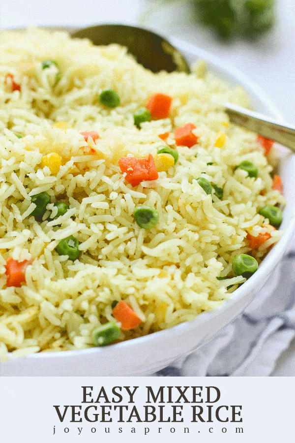 Easy Mixed Vegetable Rice - A super easy AND flavorful side! Basmati rice cooked in garlic and chicken bouillon and tossed with mixed vegetables. Quick, light and healthy too! via @joyousapron
