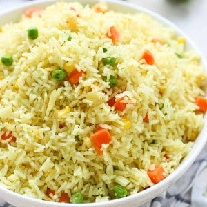 A bowl of seasoned rice with vegetables