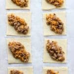 Unwrapped and uncooked Sausage and Cheese Puff Pastry Pockets