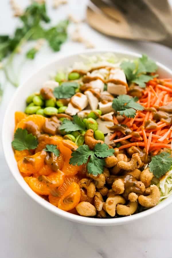 A bowl of salad with Asian Peanut Dressing