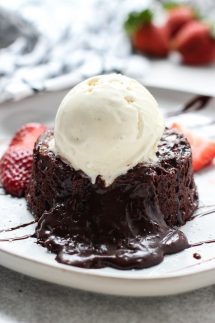 Chocolate sauce coming out of a lava cake