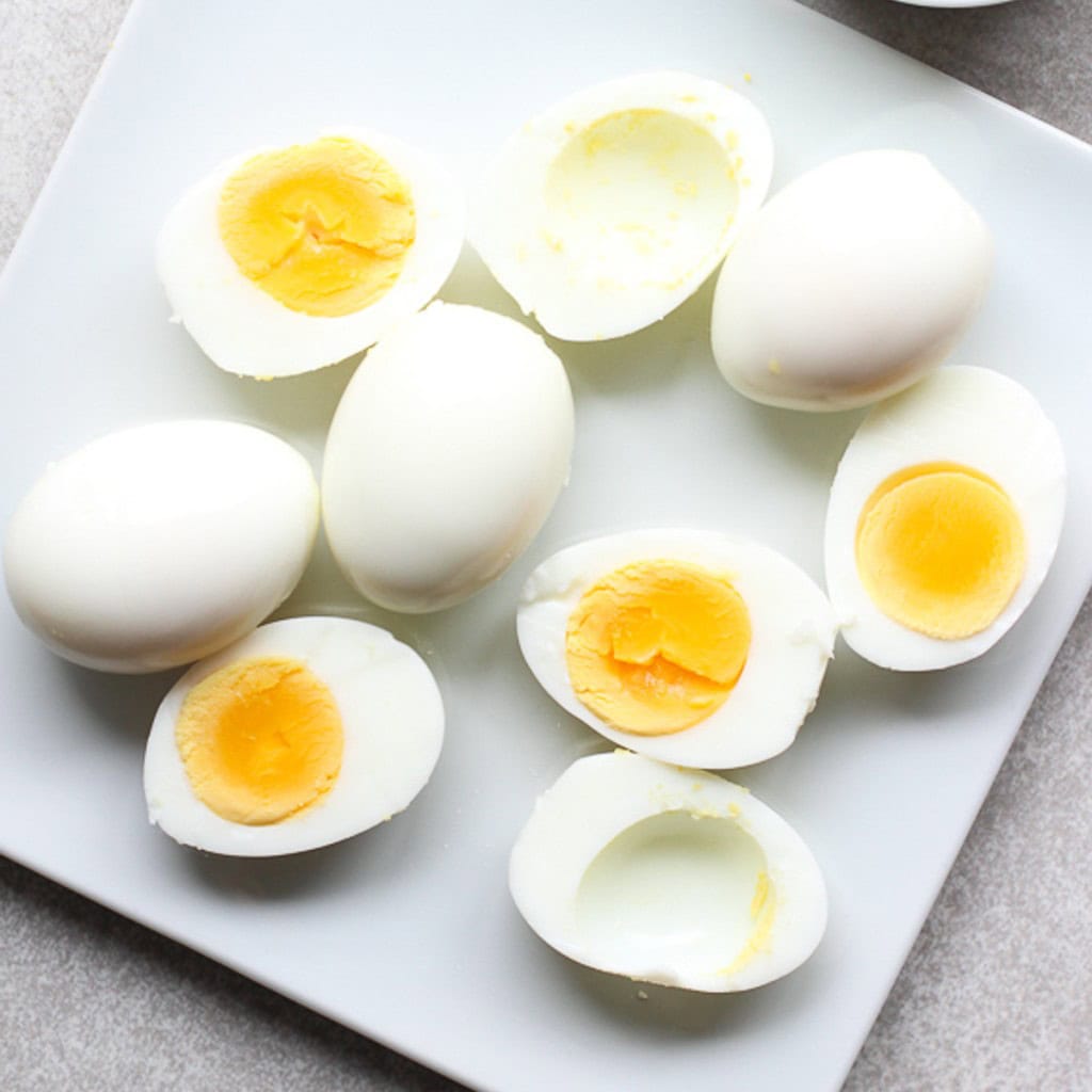 Boiled eggs, some with yoke dug out, some with yolk still in it