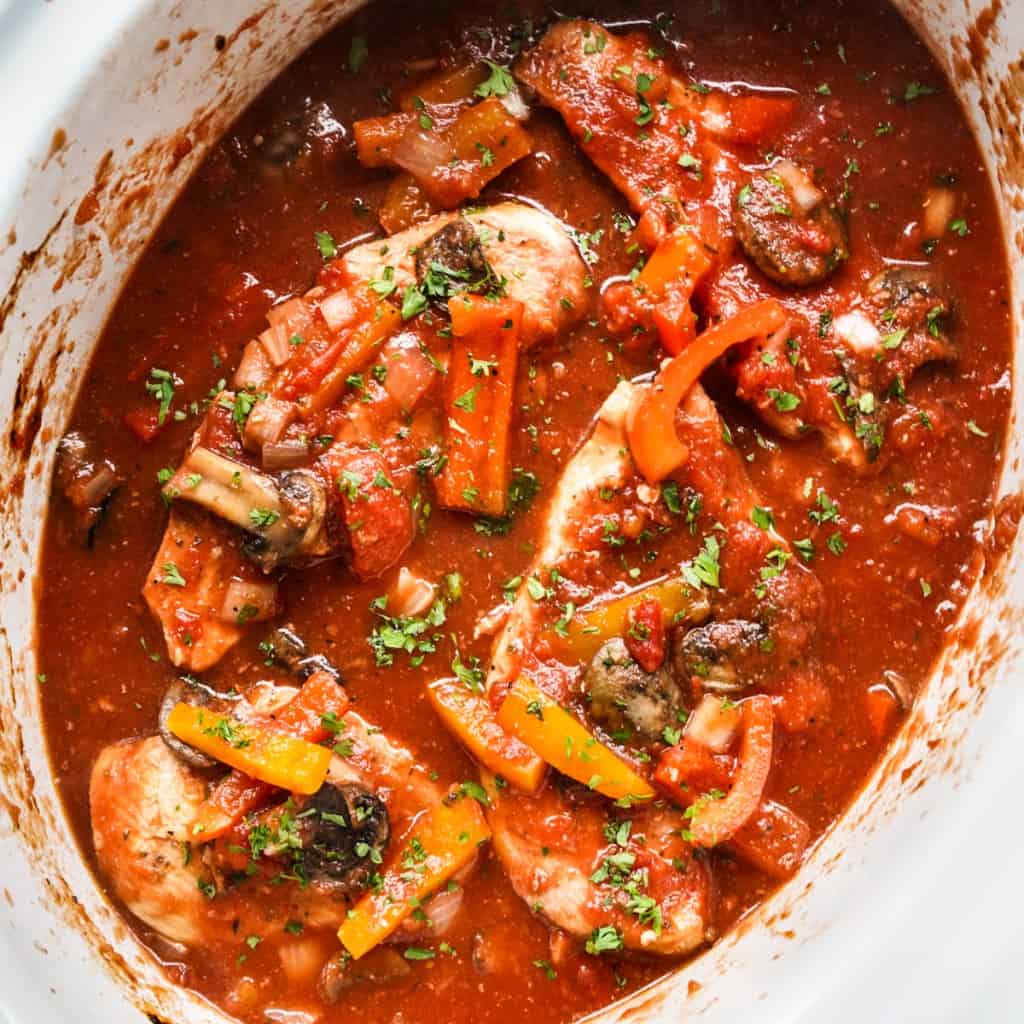 A large pot of chicken cacciatore made in the slow cooker