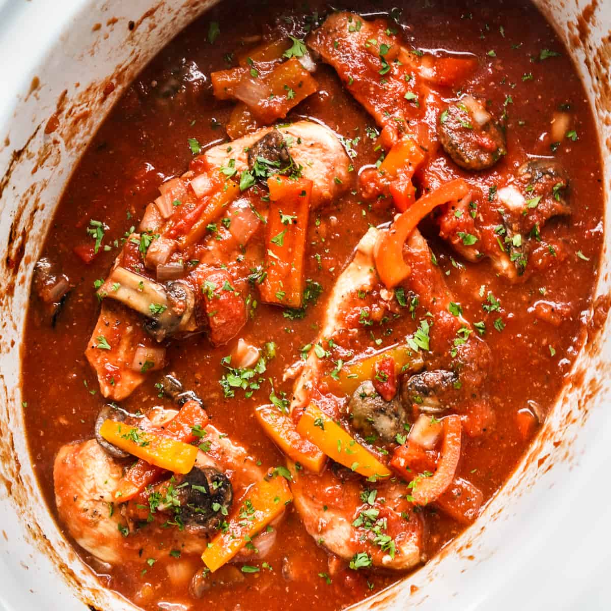 A large pot of chicken cacciatore made in the slow cooker