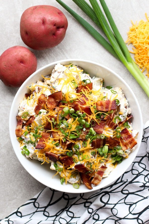A top down view of a bowl of Loaded Baked Potato Salad