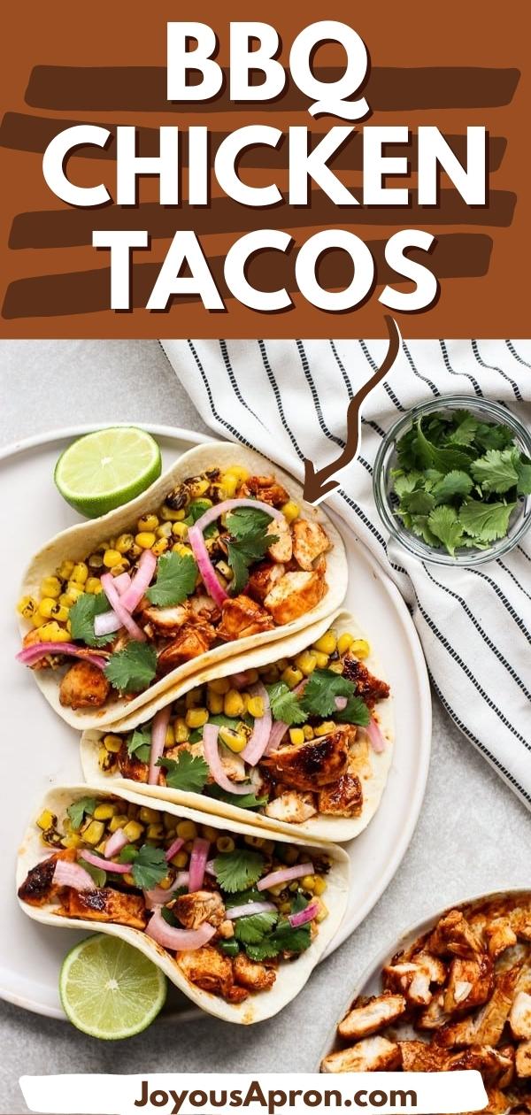 BBQ Chicken Tacos - A yummy and light Tex-Mex taco dinner recipe! Pan-fried BBQ chicken topped with cilantro, roasted corn and pickled red onions, wrapped in a soft flour tortilla. via @joyousapron