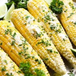 Oven Roasted Corn on the Cob with melted butter, parmesan cheese and parleys