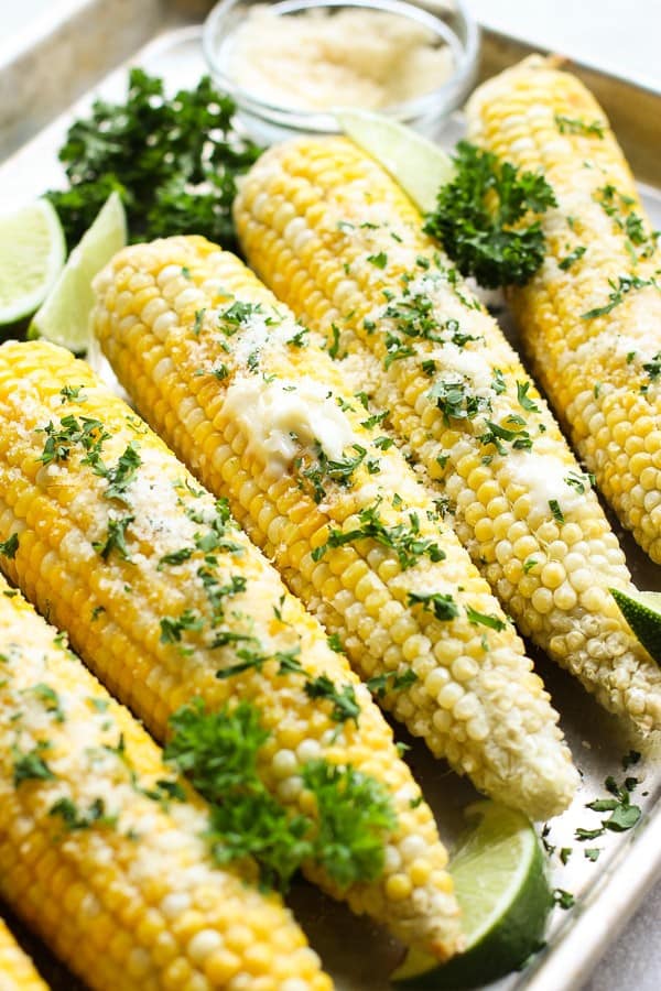 Oven Roasted Corn on the Cob with melted butter, parmesan cheese and parleys