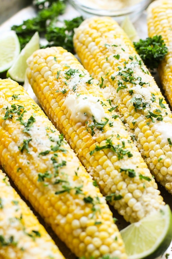 Oven Roasted Corn on the Cob with melted butter, parmesan cheese and parleys