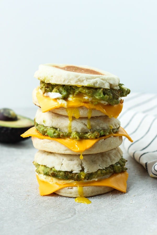 Three breakfast sandwich stacked on top of each other