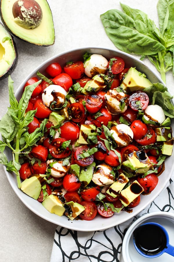 A plate of Caprese Salad with Avocado