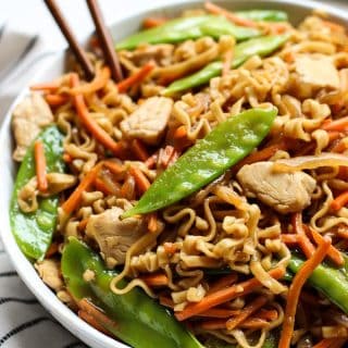 A bowl of Ramen Noodle Stir Fry with chopsticks in it