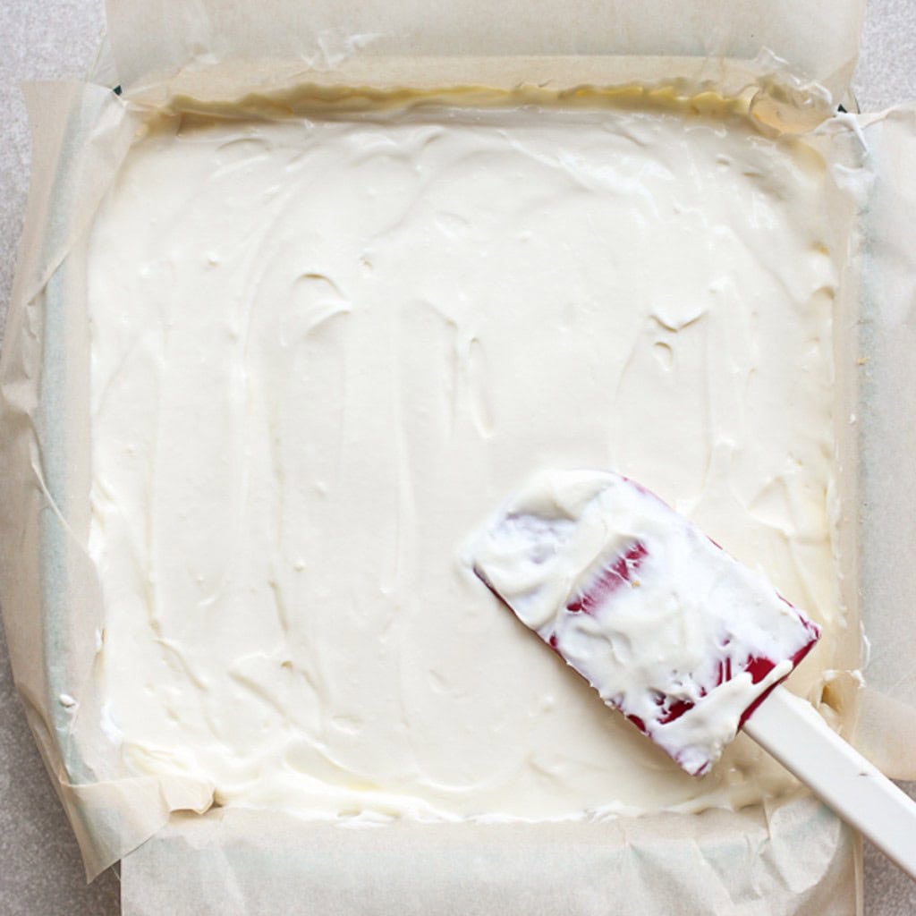 Smoothing out cream cheese mixture on a dish