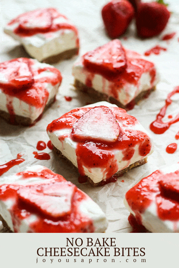 No Bake Cheesecake Bites - easy mini cheesecake bar recipe! A perfect summer dessert and sweet treat. Creamy cheesecake topped with strawberry and strawberry sauce. via @joyousapron