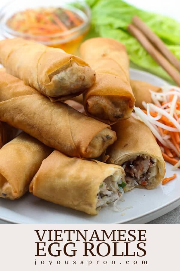 Vietnamese Egg Rolls - authentic crispy spring roll recipe! This Asian appetizer and snack is crunchy on the outside and filled with flavorful pork and shrimp filling on the inside. Oh so delicious! via @joyousapron