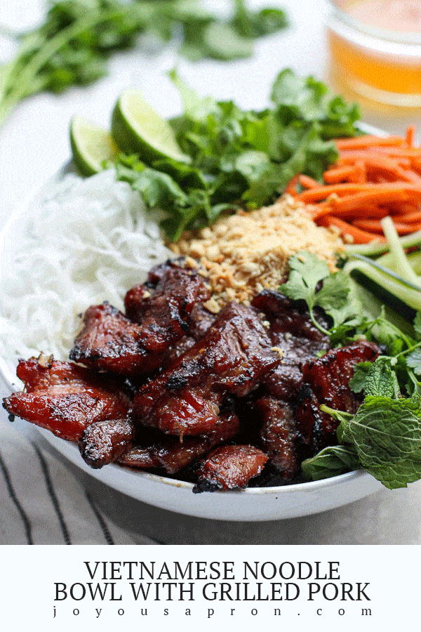Vietnamese Vermicelli Noodle Bowl - healthy and yummy Asian noodle dish with marinated grilled pork, carrots, cucumbers, mint leaves, peanuts, lime and lettuce. Tossed in a homemade sauce made with fish sauce. via @joyousapron