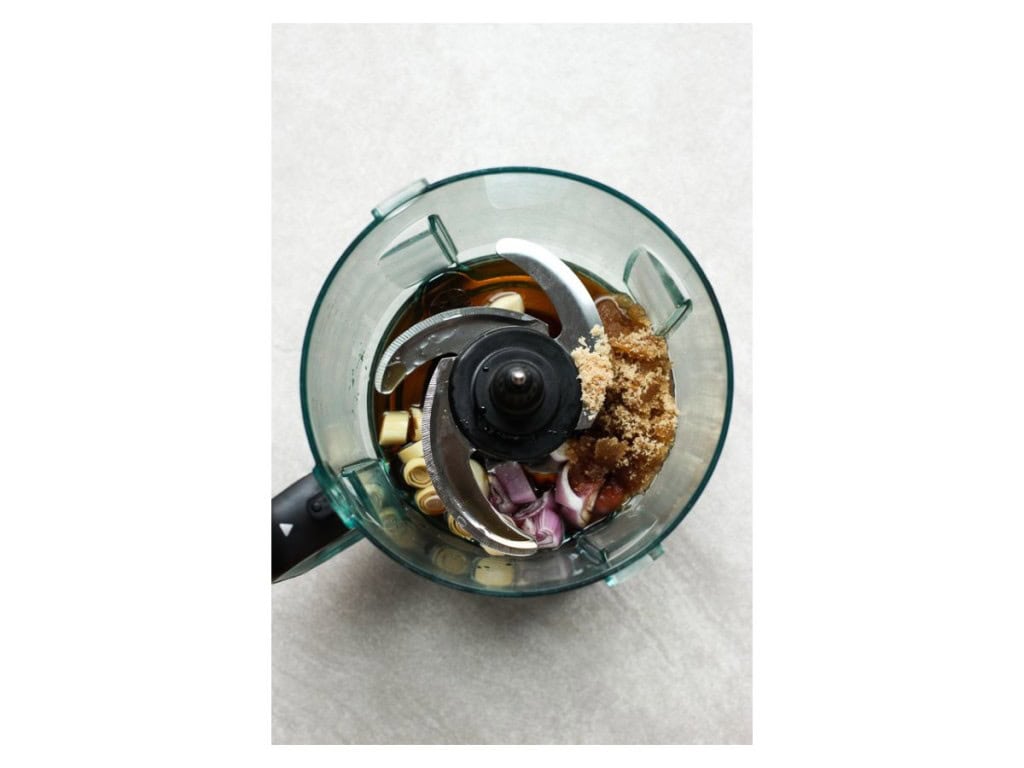 Shallots, lemongrass, fish sauce, brown sugar in a food processor.