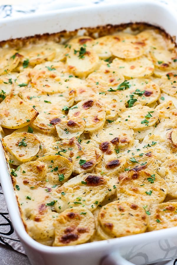 A casserole of Cheesy Garlic Scalloped Potatoes