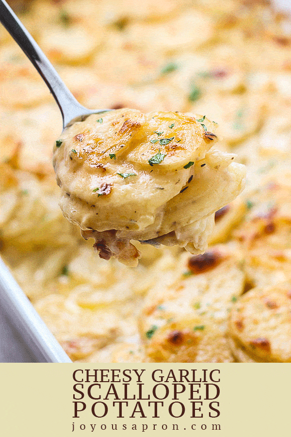 Cheesy Garlic Scalloped Potatoes - A great easy side dish for the holidays or any day! Tender and soft sliced potatoes baked to perfection and in a creamy, velvety, garlicky cheese sauce. Comfort food for the soul. via @joyousapron