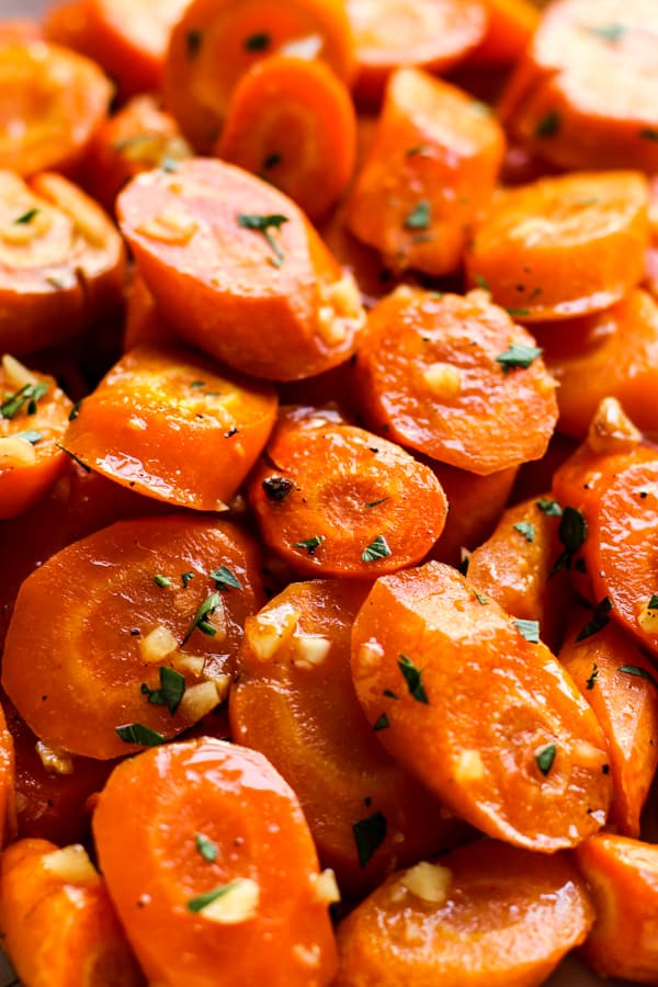 Closeup of A plate of Garlic Honey Roasted Carrots