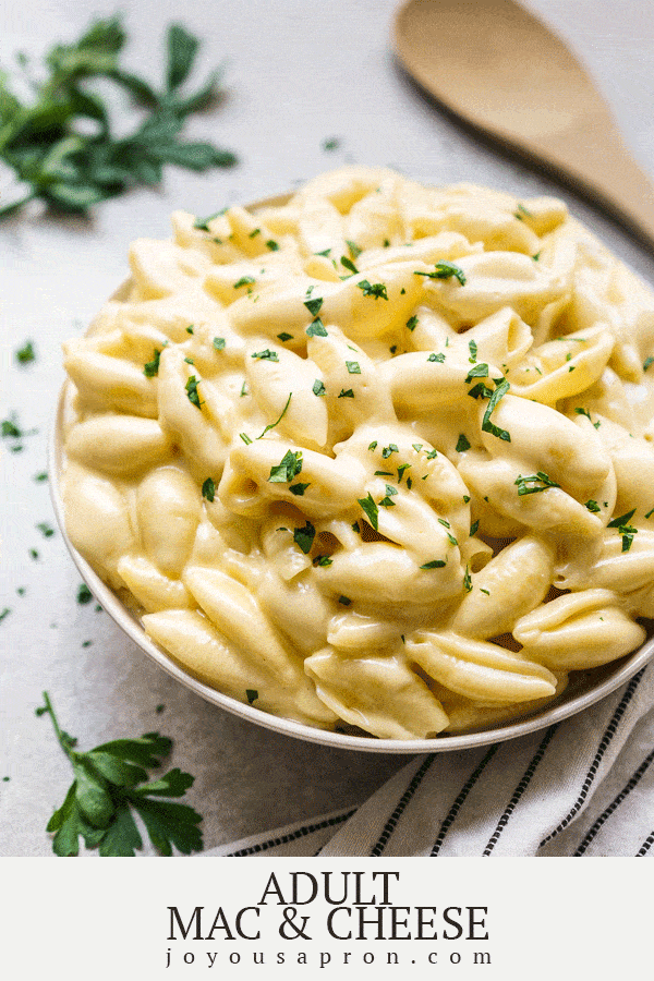 Macaroni and Cheese - a gourmet, adult and grown up version of mac and cheese, made with heavy cream, American cheese and white cheddar. Pasta is coated in a thick, creamy delicious cheese sauce. It's the classic all-American side dish for dinners and even the holidays! via @joyousapron